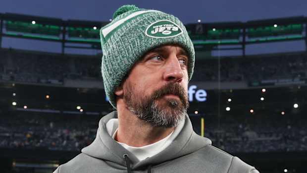 Dec 24, 2023; East Rutherford, New Jersey, USA; New York Jets quarterback Aaron Rodgers (8) on the field after the game against the Washington Commanders at MetLife Stadium. 